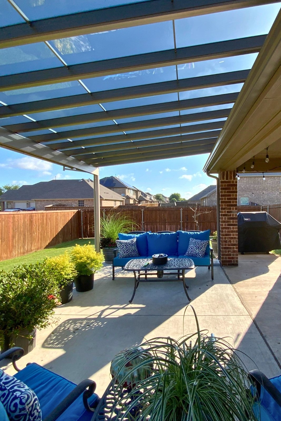 Attached RevoLu TF Series Patio Cover - Forney, TX (Urban Gray with Blue Smoke panels)